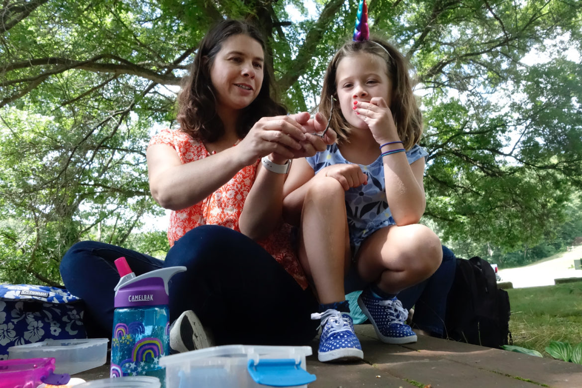 “Can you scooch so [the bug] doesn’t climb on me?” Theodora Reese, 6, asked her mother, Phoebe, during a picnic at Ambridge Reservoir. (Photo by Oliver Morrison/PublicSource)