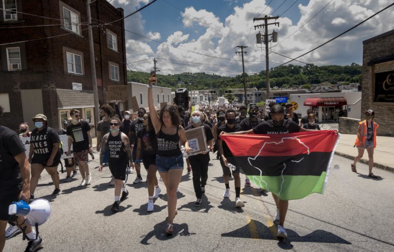 Marchers in Canonsburg head up North Central Avenue toward's the borough building during a June 20, 2020 march against racism and police brutality. (Photo by Heather Mull/PublicSource)