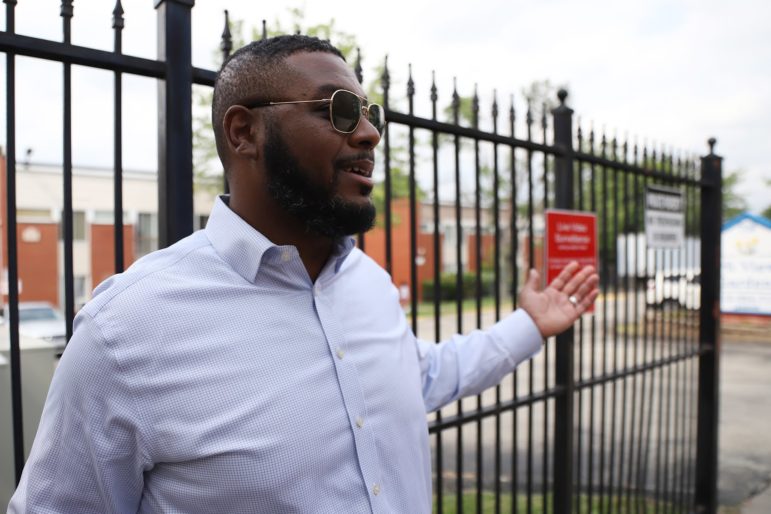 State Rep. Austin Davis, D-McKeesport, stands in front of Hi View Gardens, an affordable housing complex purchased in 2018 by PNC Bank. “They need to address the safety concerns immediately,” said Davis. “After reading your story, my initial question is: Is it safe for the people who live here to live here?” (Photo by Ryan Loew/PublicSource)