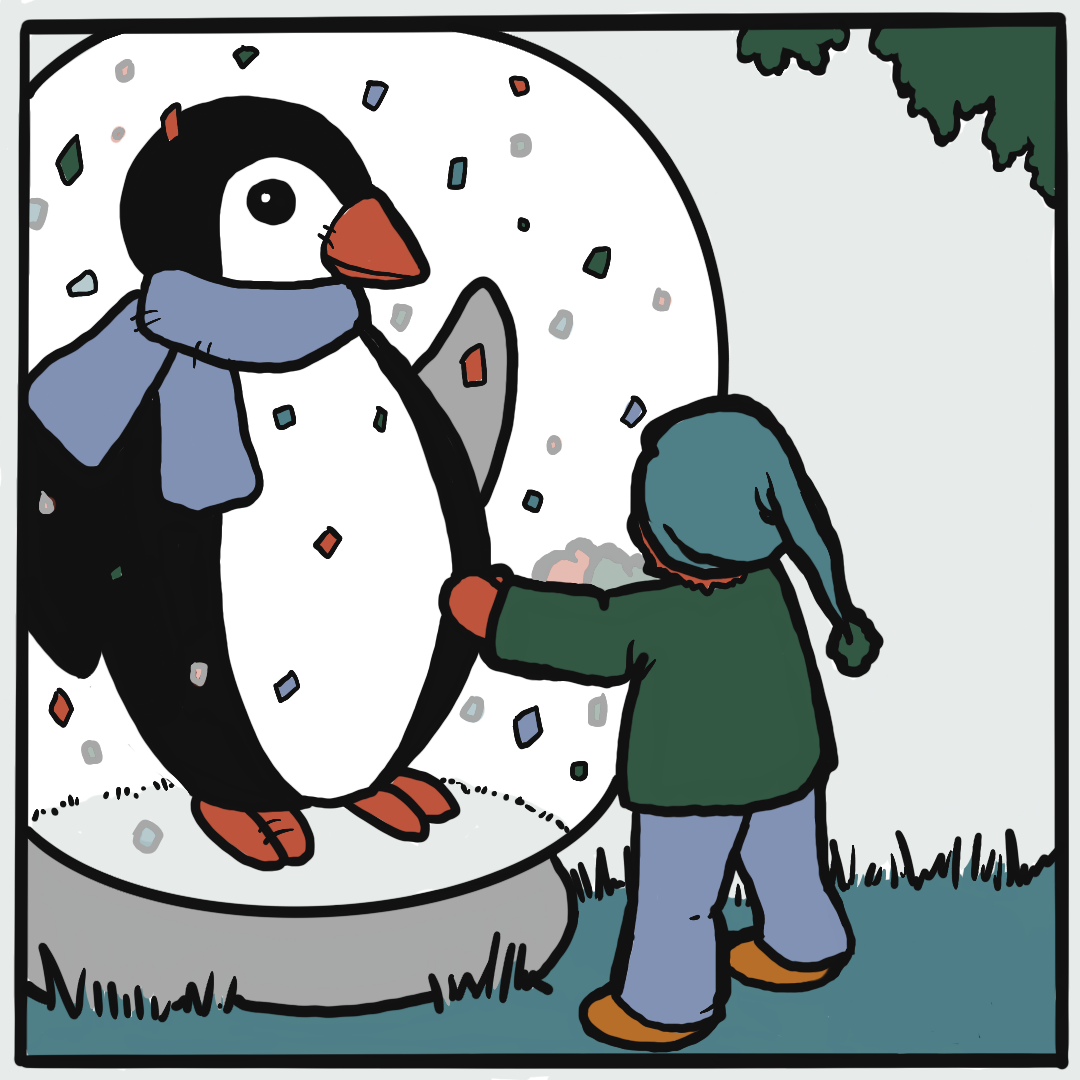 A child wearing a green coat and blue hat touches a large snow globe containing a penguin with a blue scarf.
